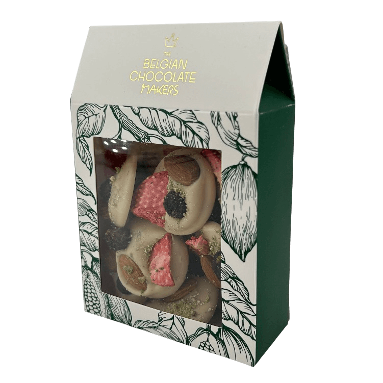 White chocolate mendiants with pistachio, almond, strawberry and blackcurrant chunks