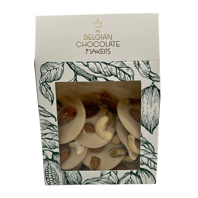 White chocolate mendiants with pistachio, almond, raisin and cashew chunks