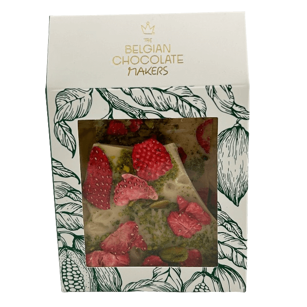 White chocolate broken bars with strawberries and pistachios