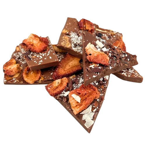 Milk chocolate broken bars with coconut, strawberry, cacao nibs
