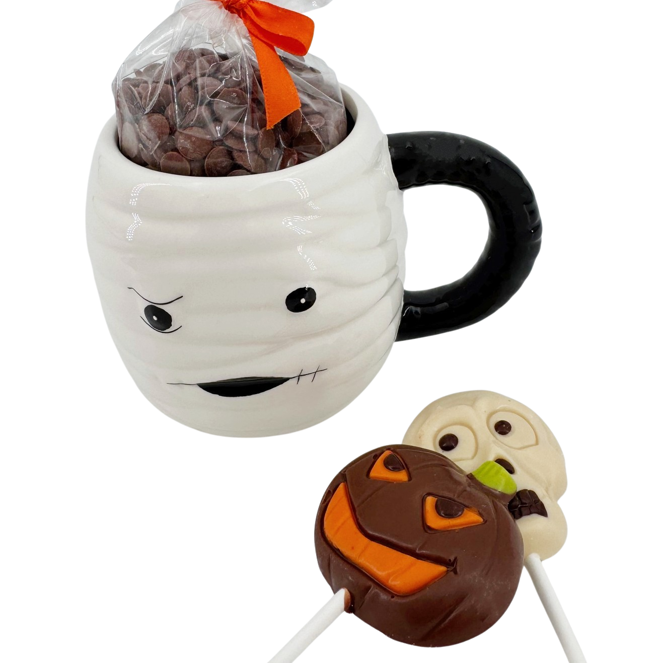 Dark chocolate drops in cup mummy with lollipops