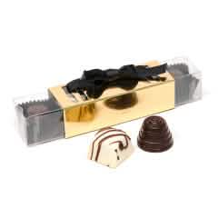 Stick of white pralines (ganache, caramel) & milk pralines (praliné) - The Belgian Chocolate Makers