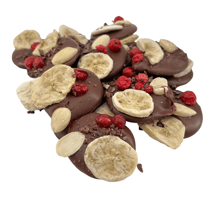 Milk chocolate mendiants with banana, almond and pecan pieces