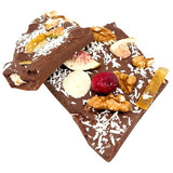 Milk chocolate broken bars with fig, lemon, cranberry, walnut, coconut