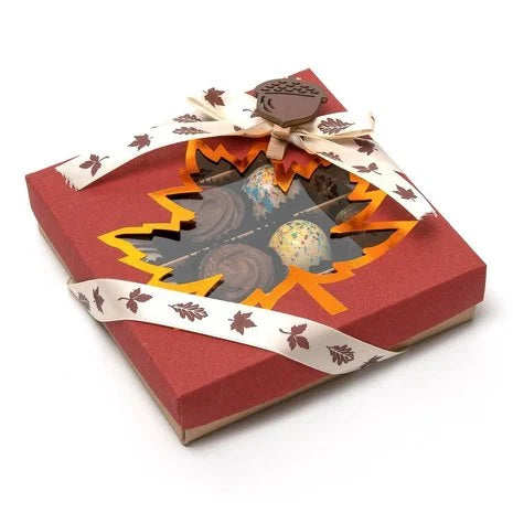 Autumn chocolate pralines in a red gift box