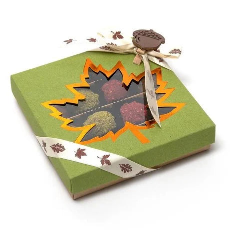 Autumn chocolate truffles in a green gift box