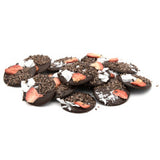 Dark chocolate mendiants with strawberries, coconut, and cacao nibs